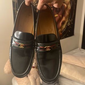 Black Gucci dress loafers.
